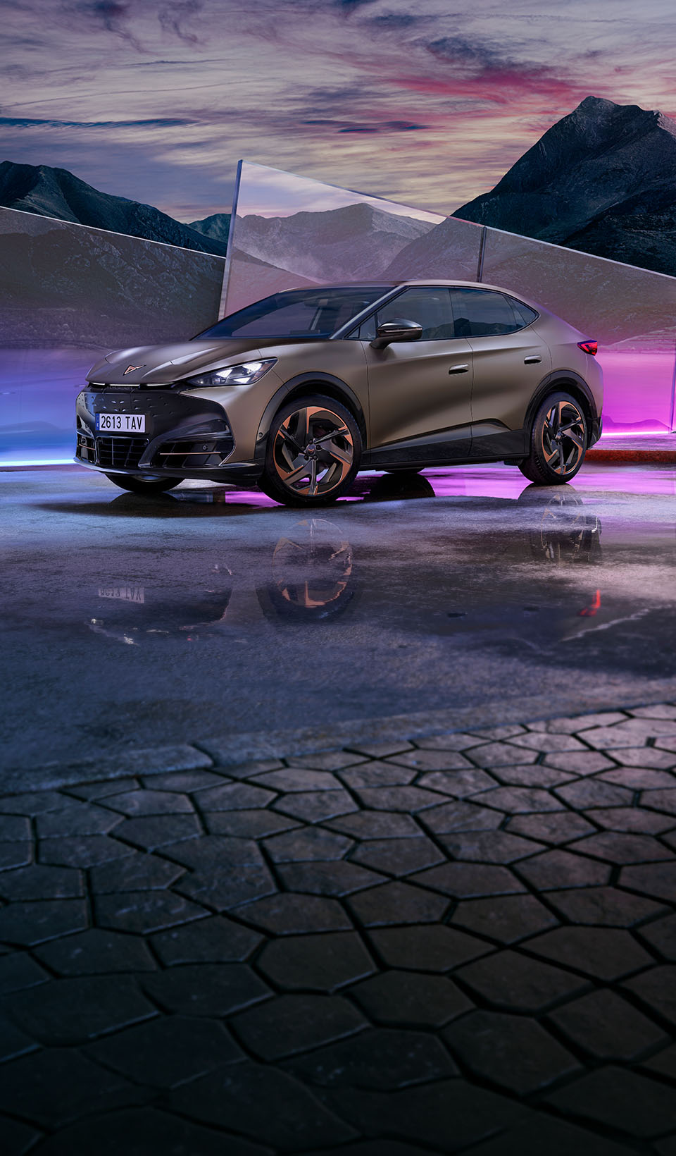 A dynamic scene featuring a CUPRA car in a sleek dark metallic color, positioned beside a blurred figure of a woman in a white dress using a VR headset and holding a conductor’s baton. 